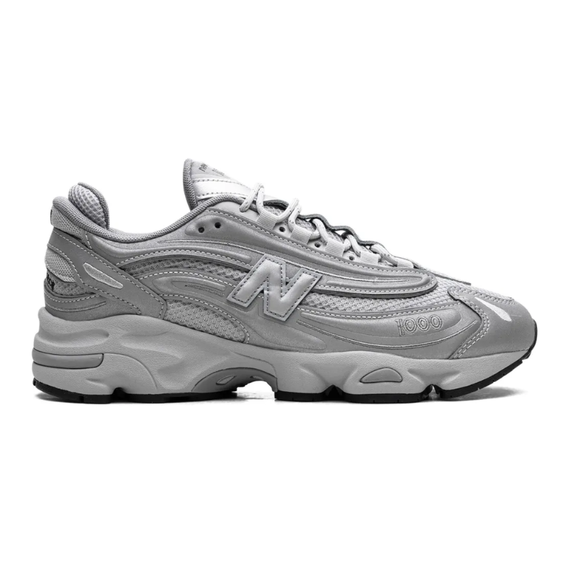 Untitled-design-2025-02-11T181807.821 New Balance 1000 – Silver Reflective - Image 1